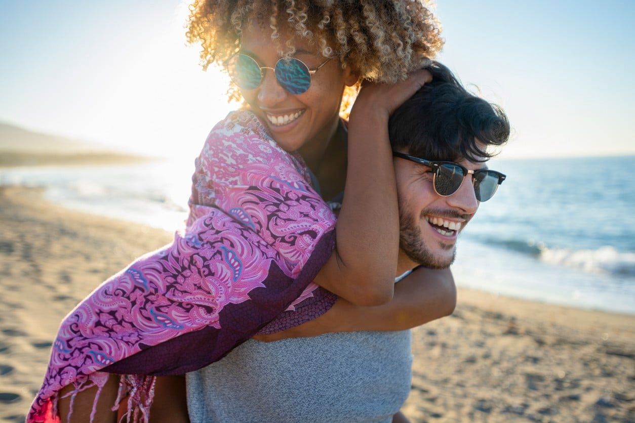 Happy couple on the beach