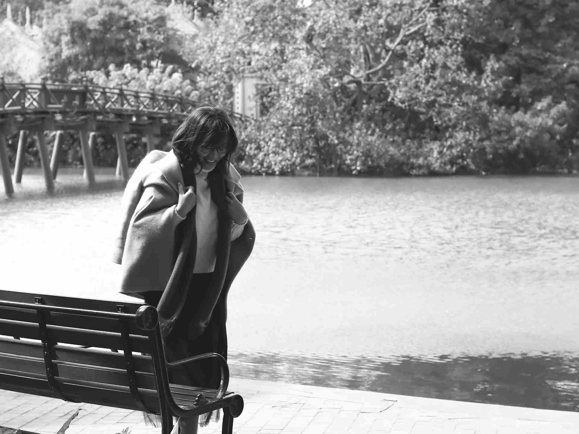 A person journaling calmly at a desk with mental wellness tools nearby, representing OCD coping strategies.