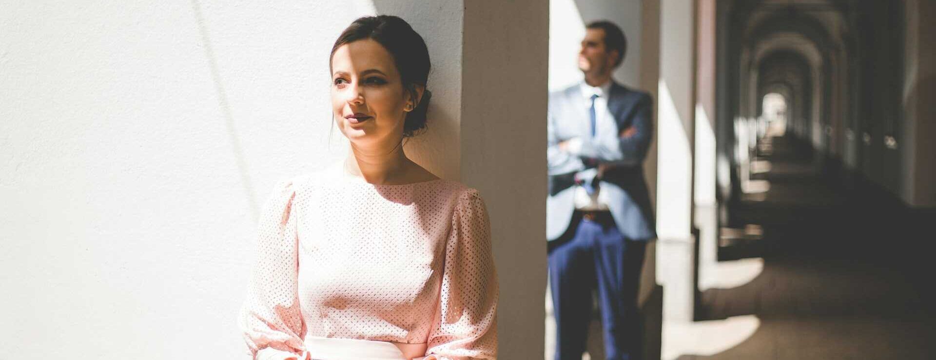 Couple standing apart, representing the growing gender divide and conflict in modern relationships